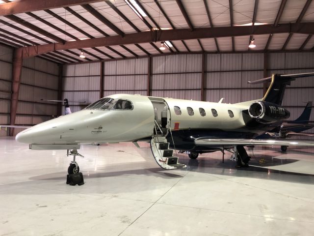 Embraer Phenom 300 (VH-VKX)