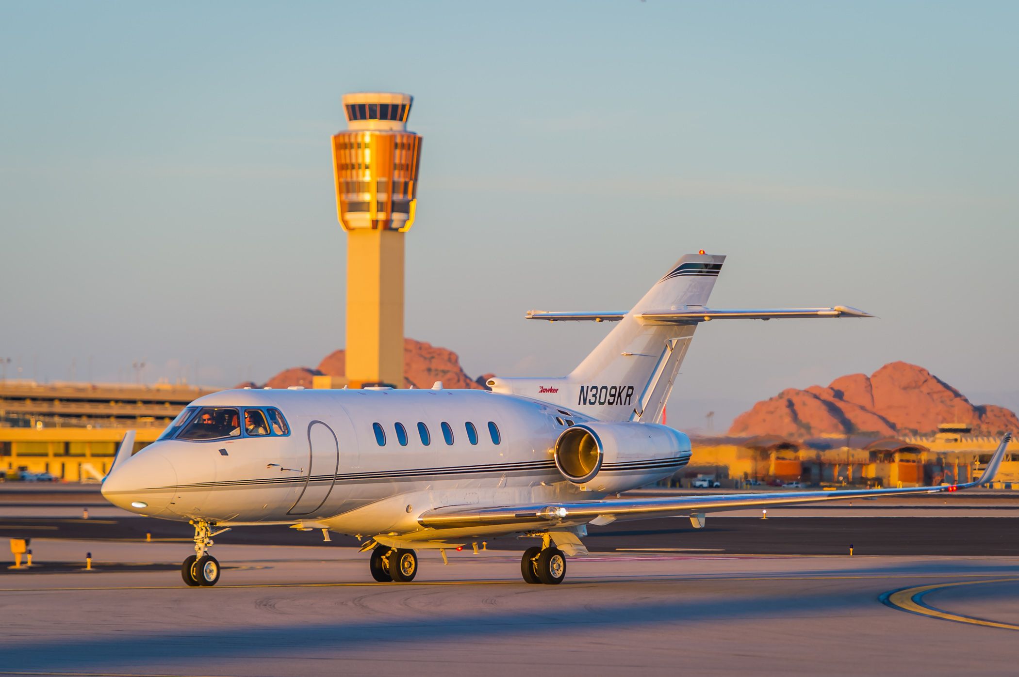 Hawker 800 (N309KR) - As the sunset over Phoenix took hold, this beautiful Hawker 900XP taxis to Swift for an overnight after a quick flight from San Antonio. Please vote if you like my work!br /©Bo Ryan Photography | a rel=nofollow href=http://www.facebook.com/boryanphotowww.facebook.com/boryanphoto/a