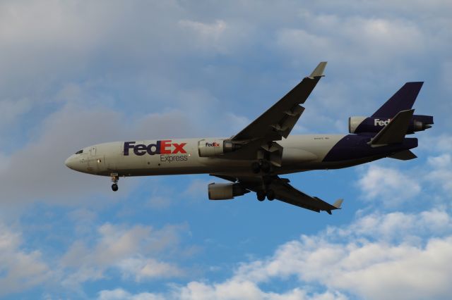 Boeing MD-11 (N584FE) - View in full for highest quality.br /Fedex MD11F on final at KDEN.