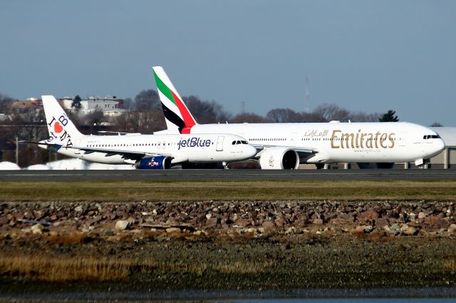 BOEING 777-300 (A6-ECH) - Escaping to warmer weather. JBU 909 heading to Nassau as EK 240 heads to Dubai