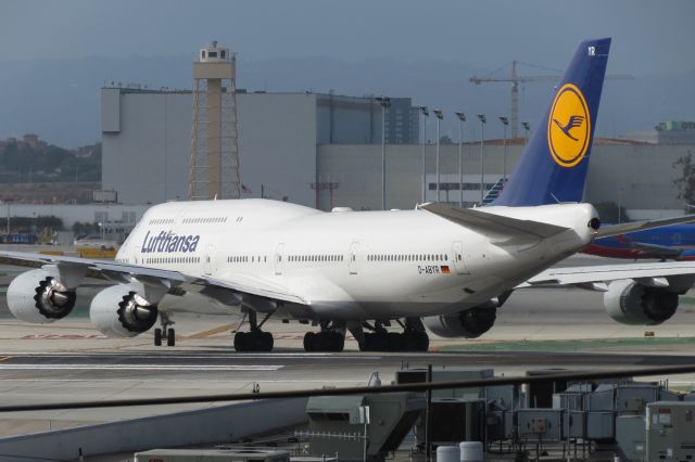 BOEING 747-8 (D-ABYR) - Taxiing off the runway and into a 20 minute lap around half of the airport while waiting for an open gate.