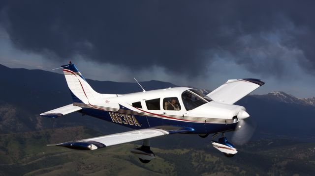 Piper Cherokee (N63BA) - Virga on the front range of the Rocky Mountains. Spirit In The Sky - 2010 Lindy Winner at Oskosh Air Venture. Air To Air photograph by Mitch Bowers at Imagewerx.us.of Denver, Colorado