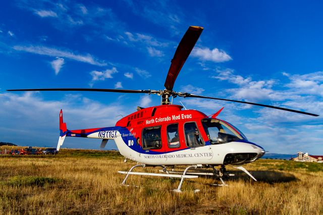 Bell 407 (N911GX) - Waiting with N912GX to escort Northern Colorado Honor Flight #21, 9/9/2018.