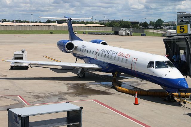 Embraer ERJ-145 (N812HK) - By the terminal.