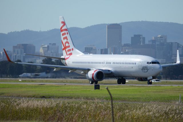 Boeing 737-800 (VH-YIB) - On taxiway heading for take-off on runway 05. Wednesday, 21st May 2014.