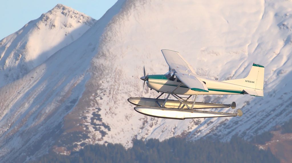 Cessna Skywagon 180 (N7684K) - Climbing out of Juneau on a sunny morning