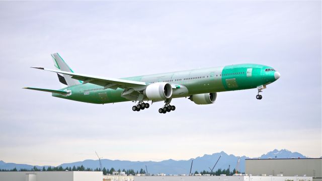 BOEING 777-300 (A6-ENW) - BOE931 on final to Rwy 16R to complete its maiden flight on 10/13/14. (LN:1249 / cn 41369).