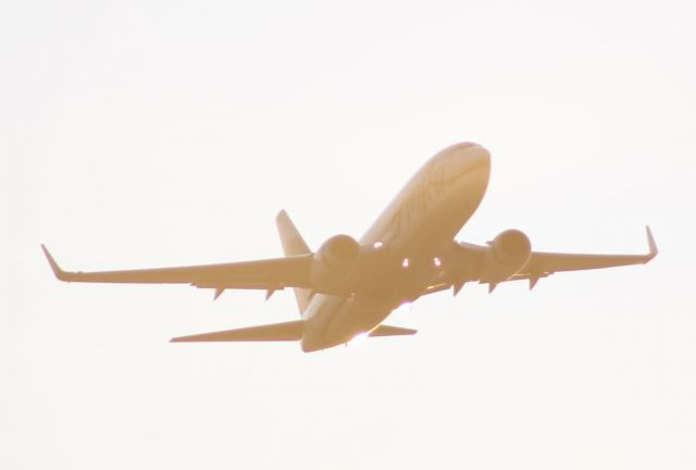 — — - Alaska 7378 with the sunsetting behind.