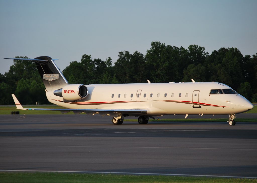 Canadair Regional Jet CRJ-200 (N141SH) - STEWART-HAAS RACING LLC arriving at KJQF - 6/1/14