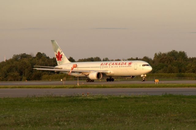 BOEING 767-300 (C-GLCA) - Taking off from Rwy 25 for a non-stop service to Frankfurt.