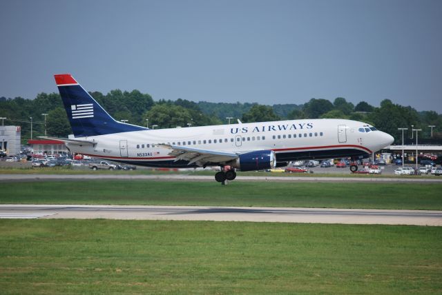 BOEING 737-300 (N533AU) - Arriving runway 18C - 6/28/09