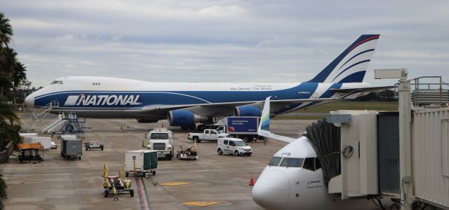 Boeing 747-400 (N663CA) - 12/23/22 parked on the east side of the pax terminal