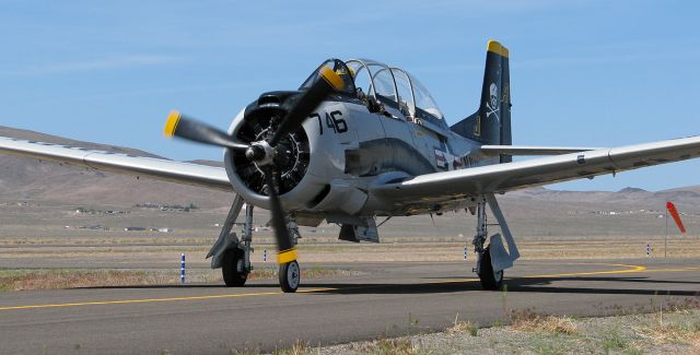 North American Trojan (N746SH) - A North American T-28C Trojan (N746SH, USN 140492) taxies past me on Alpha after landing on Runway 24.