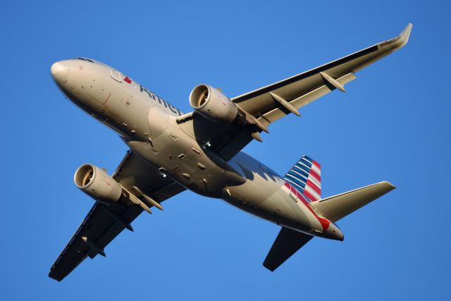 Airbus A319 (N5007E) - Runway 27 at sunset on 12-07-19