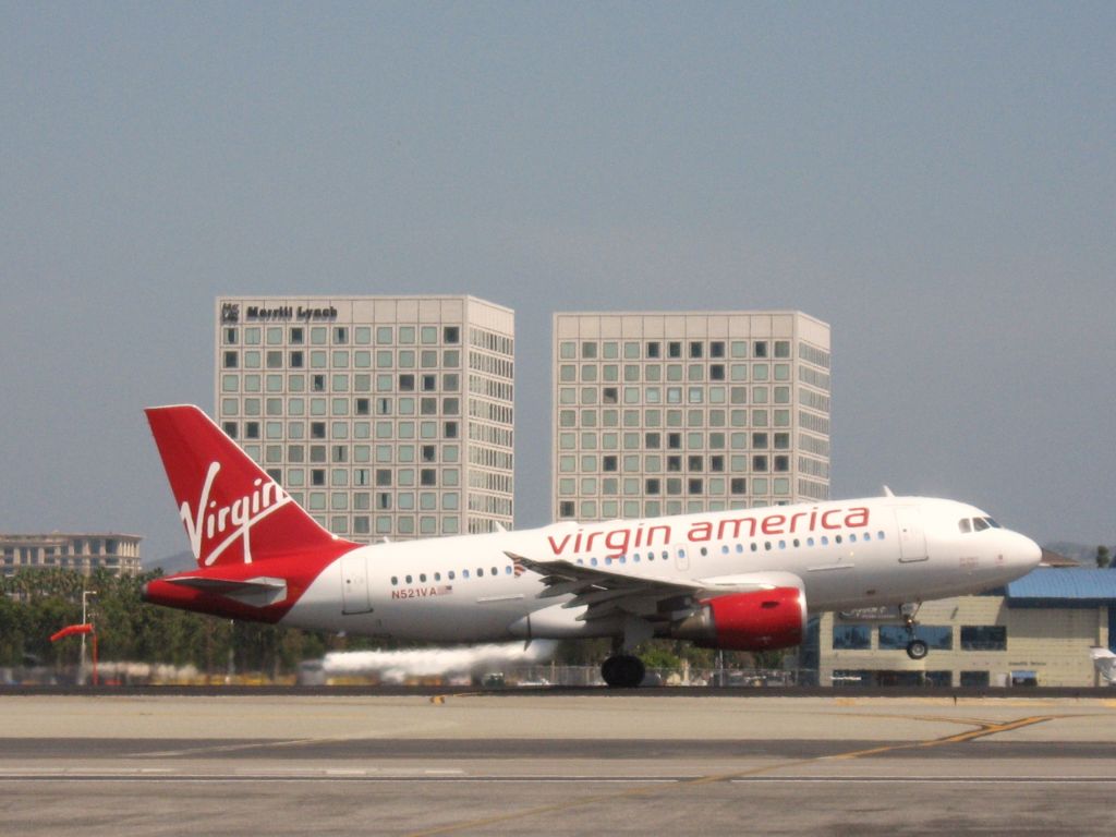 Airbus A319 (N521VA) - Taking off from RWY 19R