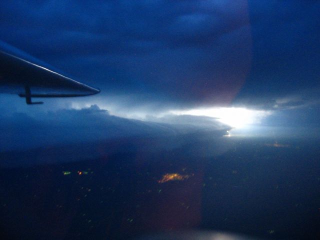 Cessna Cardinal (N7577V) - Lightning storm lighting up the clouds on the plains of Nebraska.  Dad and I on the way back from Denver.