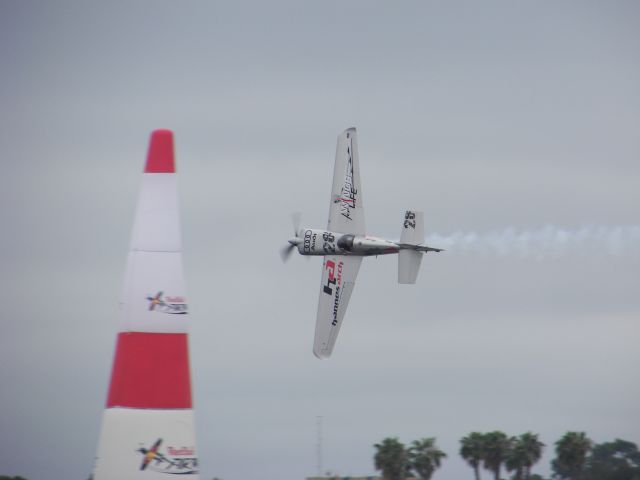 ZIVKO Edge 540 — - Red Bull Air Race 2008  San Diego, CA  Austrian Hannes Arch thru the chicane!