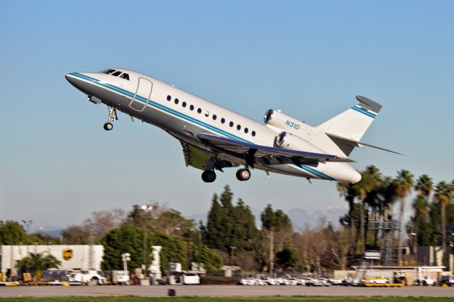 Dassault Falcon 900 (N31D) - A 2001 Dassault Falcon 900 rocketing off the runway during a short, high powered take off at KLGB... All of us watching gave it a "10"