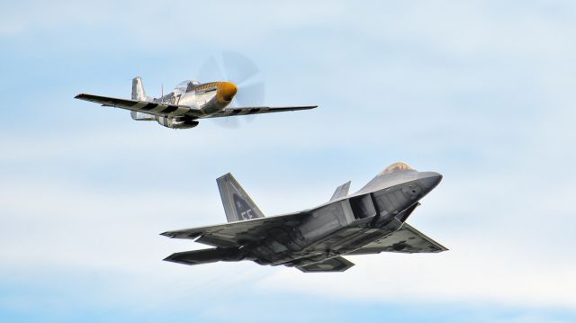 North American P-51 Mustang (N51JB) - P-51D Bald Eagle and F-22A 08-4169 in a USAF Heritage Flight at Thunder Over Michigan Sat. 08/12/2023 at Willow Run Airport