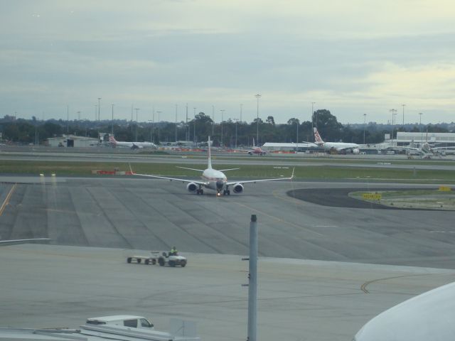 Boeing 737-800 (PK-GFM) - TAXI TO PARKING