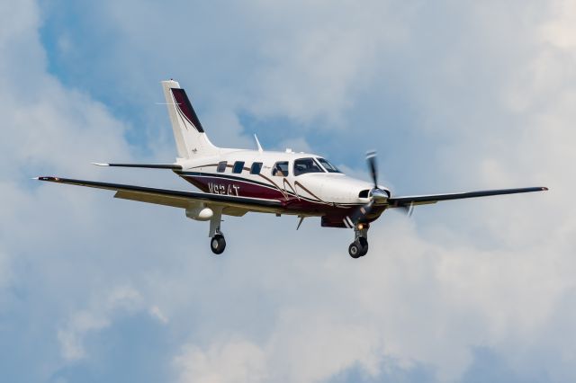 Piper Malibu Mirage (N924T) - I was standing at the aircraft viewing area at APF and captured this Piper Malibu Mirage on final approach.