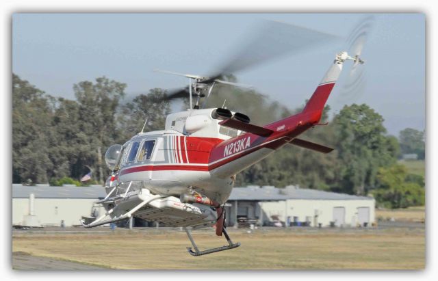 Bell VH-1 (N213KA) - 1981 Bell 212 departs Merced Regional Airport (KMCE)