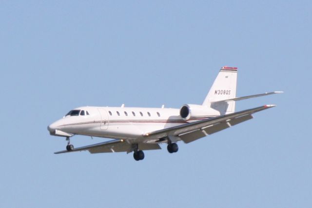 Cessna Citation Sovereign (N308QS) - Cessna Citation Sovereign (N308QS) on approach to Runway 32 at Sarasota-Bradenton International Airport