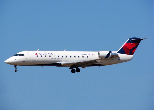 Canadair Regional Jet CRJ-200 (N868AS) - At Shreveport Regional.