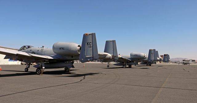 Fairchild-Republic Thunderbolt 2 (79-0118) - USAF Fairchild-Republic  A-10 Thunderbolt II "Warthawg" (79-0118)br /... Ramped on Stellar West with an F-5 ...br /303rd Fighter Squadron "KC Hawgs"br /442nd Fighter Wingbr /442nd Operations Groupbr /Air Force Reserve Commandbr /Whiteman AFB, Missouribr /br /(* The F-5F in the background is a Tactical Air agency aircraft. *)