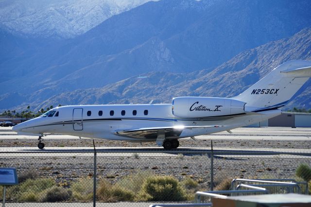 Cessna Citation X (N253CX) - Standing at the Palm Springs Aircraft Museum.  Have I walked further to the left the pavement view rises above the fence.