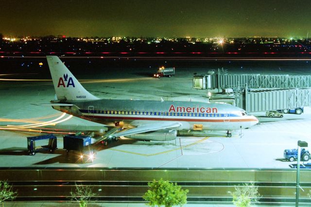 Boeing 737-200 (N461GB) - KSJC - early 1990s before American moved all of the ex Aircal -200s out of the area - this Terminal A parking lot photo was a vain attempt to work some night shots back in the days of rolled 35mm film. Not my best shot at a time exposure. 19306 LN: 13. Delv scheduled new to Pacific Airlines but listed as not taken.