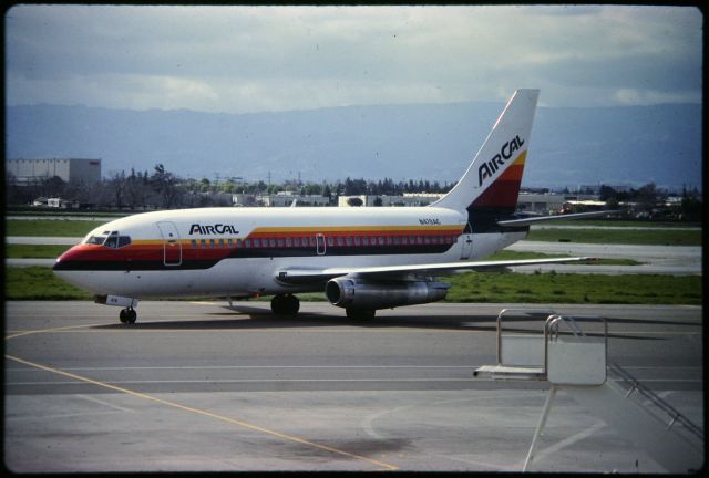 Boeing 737-200 (N470AC) - SJC - Air Cal 737 after pushback - ready for a flight to KSNA - film from the old OBS deck at SJC.