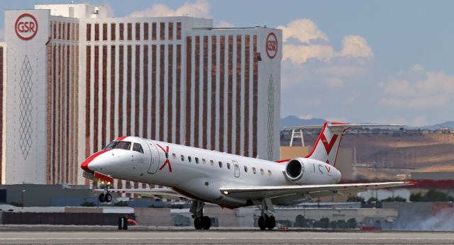 Embraer ERJ-135 (N261JX) - Noon hour (12:37) arrival from downstate (KLAS).