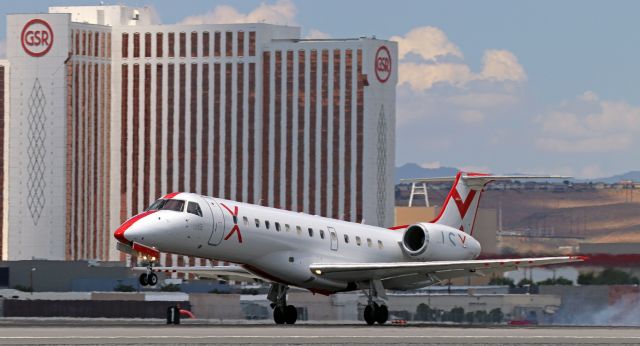 Embraer ERJ-135 (N261JX) - Noon hour (12:37) arrival from downstate (KLAS).