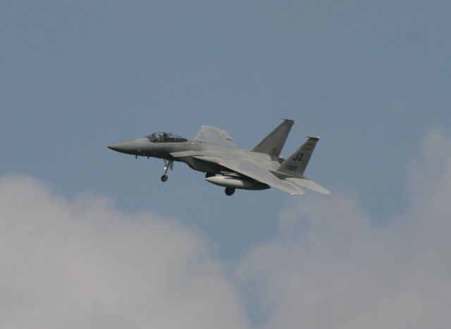 McDonnell Douglas F-15 Eagle — - F-15 Eagle. I was driving north out of Destin passing Eglin AFB where they had numerous jets performing touch & gos. I pulled over and took photos of this impromptu airshow.