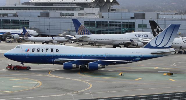 Boeing 747-400 (N178UA) - Being towed to the Superbay for an overnight rest.
