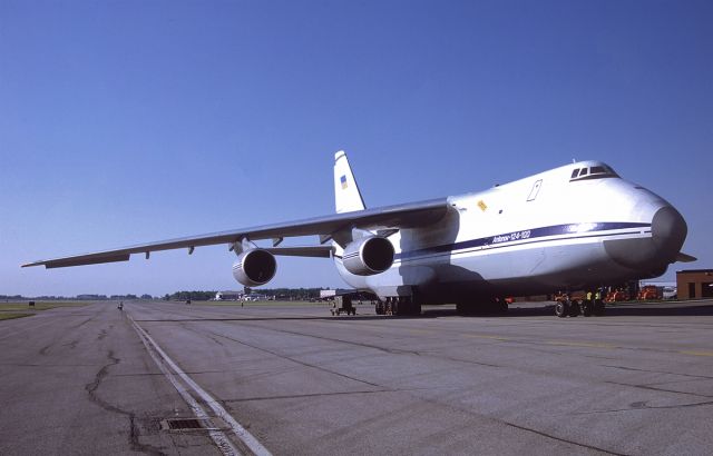 Antonov An-12 (UR-86066) - Waiting for a locomotive engine.