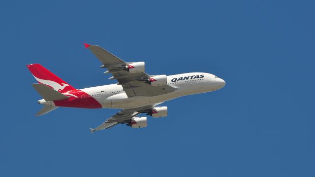 Airbus A380-800 (VH-OQH) - Running almost an hour late from Melbourne International (Tullamarine) Airport is Qantas A380 QF93 Melbourne to LA. Having taking of from RW16 I snapped this when I was in St Albans. 02/12/2011