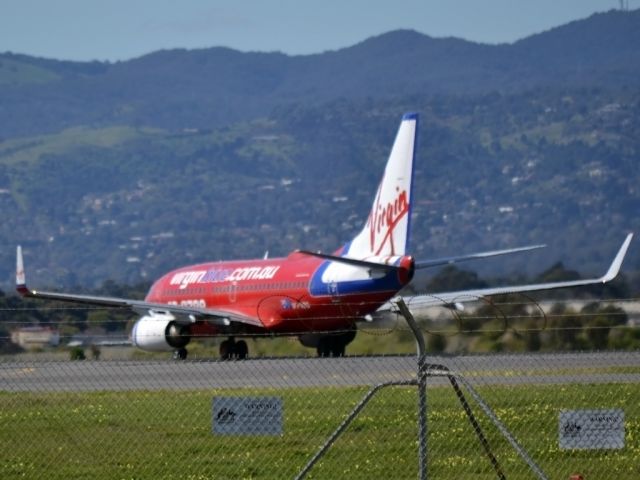 Boeing 737-700 (VH-VBO) - Rolling for a short take off run on runway 05.