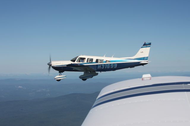 Piper Saratoga (N31699) - Off wing of N15240 Taken by S. Peterson