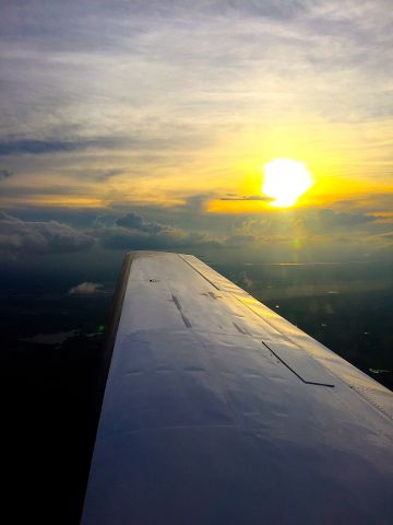 Piper Malibu Mirage (N4366Z) - Sunset approach into Houston. 