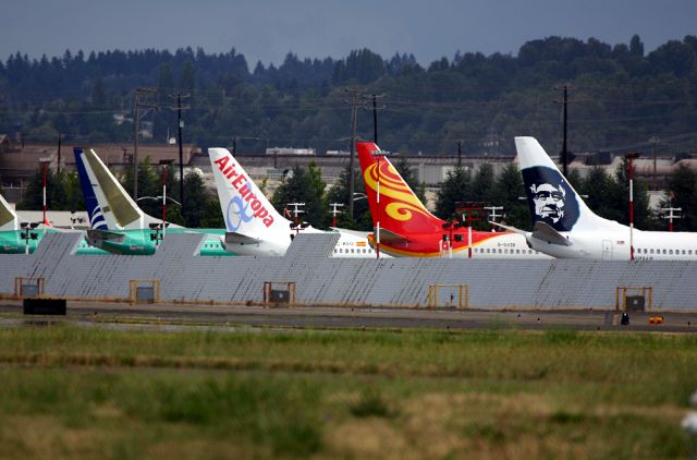 Boeing 737-800 (N583AS) - KBFI- Tale of the Tails - (R) New Alaska 737-800 N583AS, next is Hinaan Airlines B-5338, the 1st aircraft in this color for Hinaan, Air Europa B737-800 EC-KEO and 737-700 for Copa.- no reg. This July 29th, 2007 at Boeing Field, Seattle.