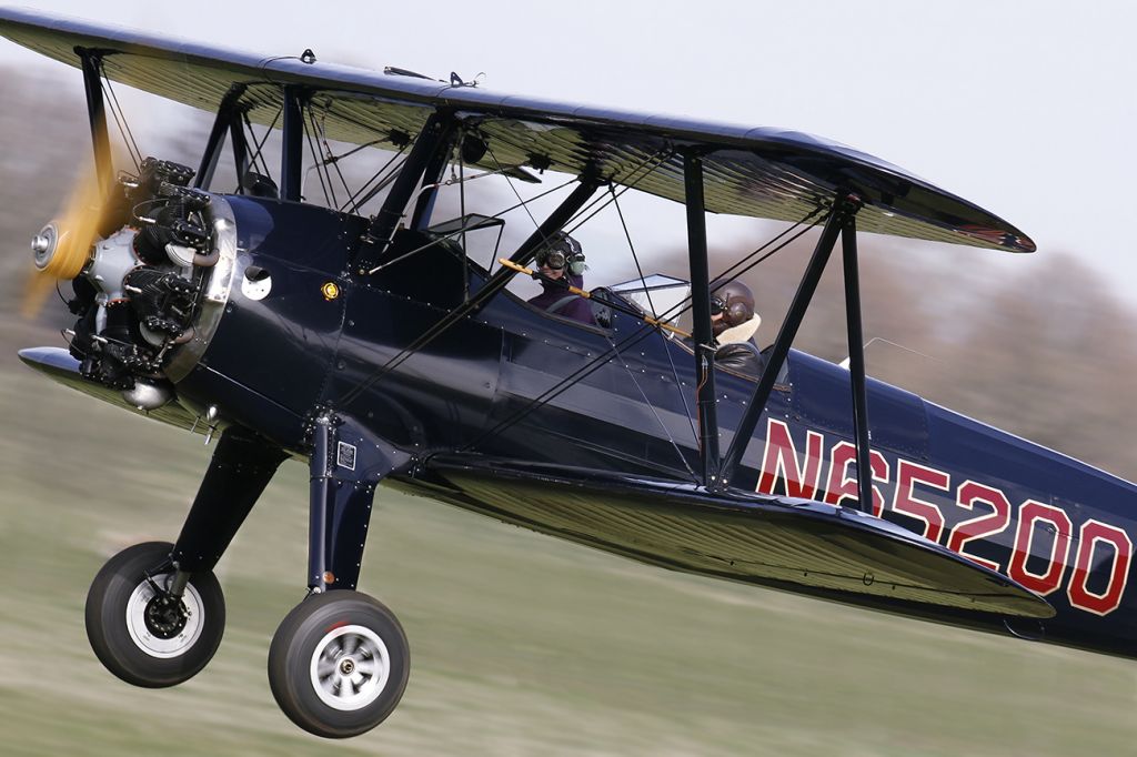 Cessna Skyhawk (N65200) - [cn.75-3817]. Boeing PT-27 Kaydet [D75N1] N65200 leaving the grass strip at Lashenden EGKH Headcorn Kent England 10.3.2012.