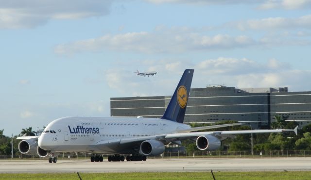 Airbus A380-800 (D-AIMN) - With an American Airlines B777-300ER.On finals "In the background!