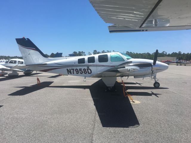 Beechcraft Baron (58) (N7958D) - Parked in the adjacent tiedown on the ramp in KJKA. I used to fly this Baron when it was based at Benton-Saline Co. airport just southwest of Little Rock! Small world!