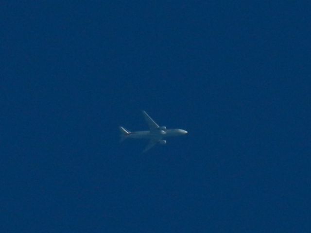 Boeing 777-200 (N767AJ) - An American Airlines Boeing 777-200ER Flies By En-Route To RDU