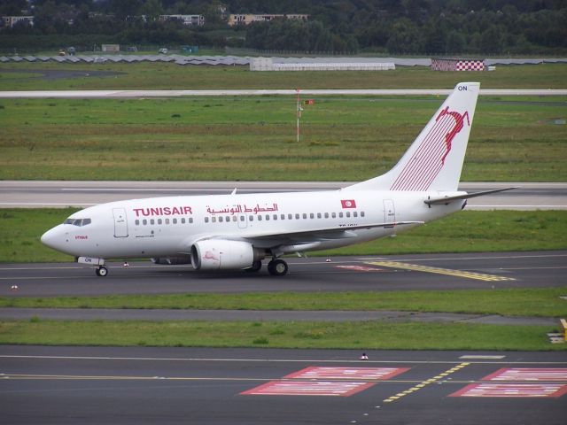 BOEING 737-600 (TS-ION) - Photo during August 2014 c/n 29499
