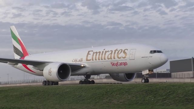 BOEING 777-200LR (A6-EFJ) - B772 Emirates passing taxiway Quebec towards AMS Cargo terminal 