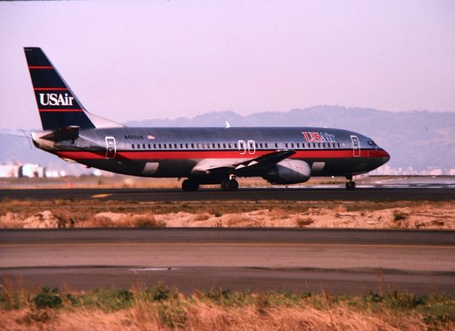 BOEING 737-400 (N420US) - KSFO - US Air 737-4 rolling onto Runway 1L at San Francisco. date apprx Fall 1993.CN:23987br /LN:1698 delv new to Piedmont Airlines April 1989 , taken by US Air in August 1989.