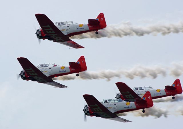 North American T-6 Texan (N3267G) - GREENWOOD LAKE AIRPORT, WEST MILFORD, NEW JERSEY, USA-JUNE 11, 2023: Seen by RF at the 2023 Greenwood Lake Airshow was the Aeroshell Aerobatic Team. This team flies four AT-6 Texans. Here we see the team during their performance.